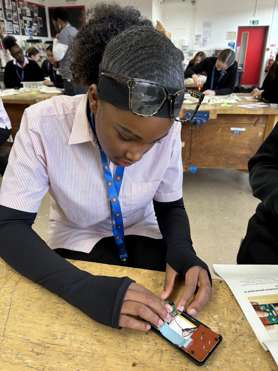 Secondary school girl fixing a consul